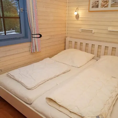 Prázdninový dům Blockhaus Mit W-lan, Zaun Und In Strandnaehe Damp